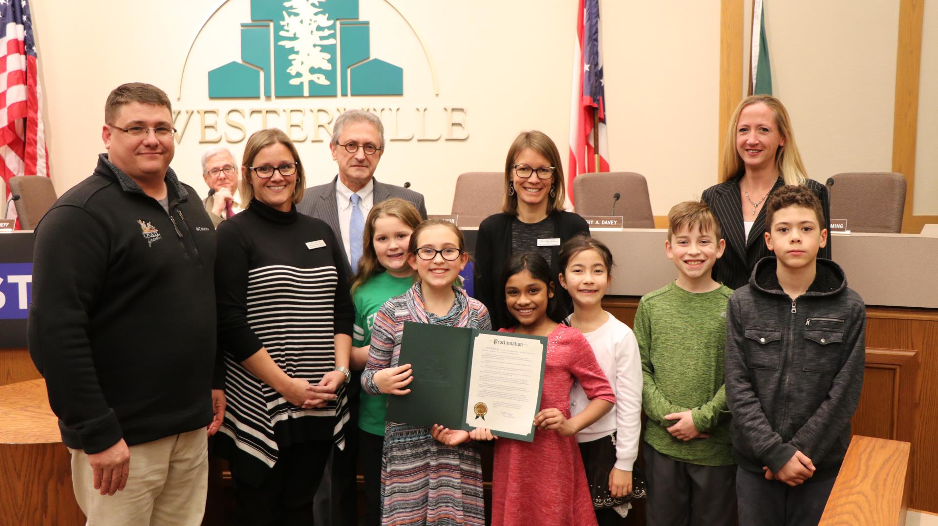 Mike Reterer w./ Ohio Pollinator Habitat Initiative and Susie Smucker and Kate Mantenicks with Westerville City Schools accepted Proclamation