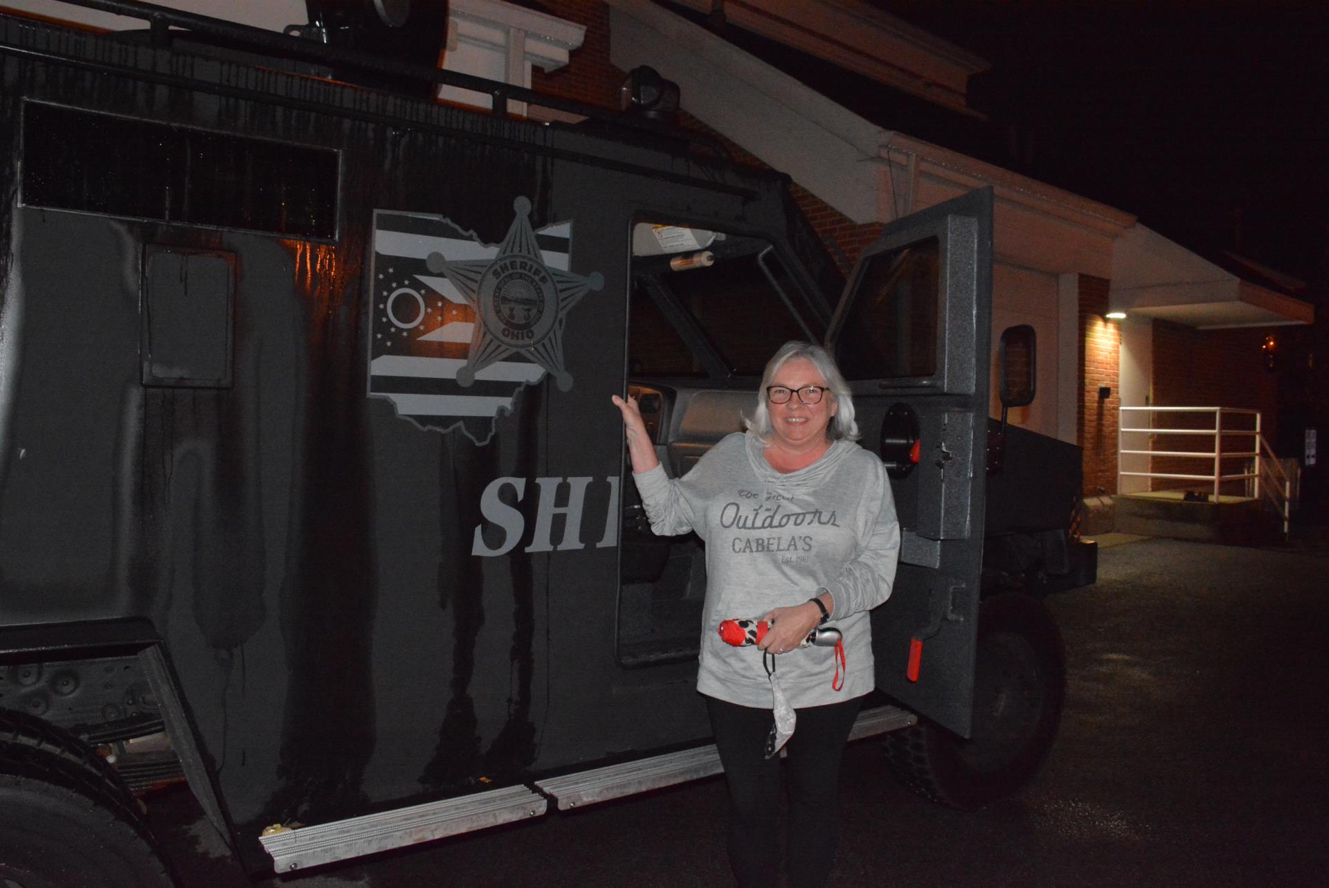 Lady with Sheriff Van